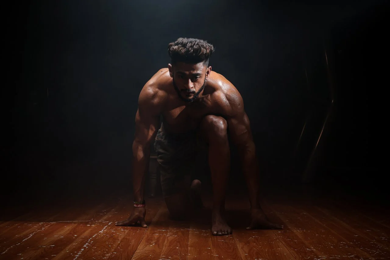 Mastering the First Impression: Your intriguing post title goes here Dynamic image of a muscular man in a kneeling start position, highlighting strength and focus.